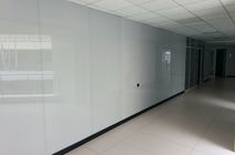 Облицовка стеклянными панелями в офисе СПК